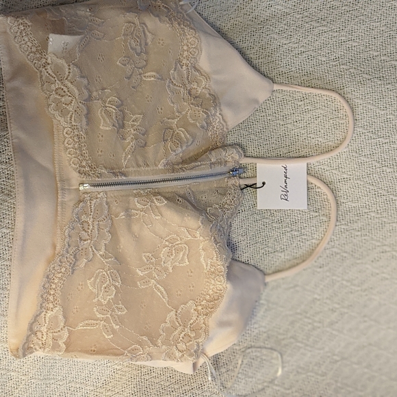 Cream Crop top with Front Padding a Lace Back - Picture 2 of 3